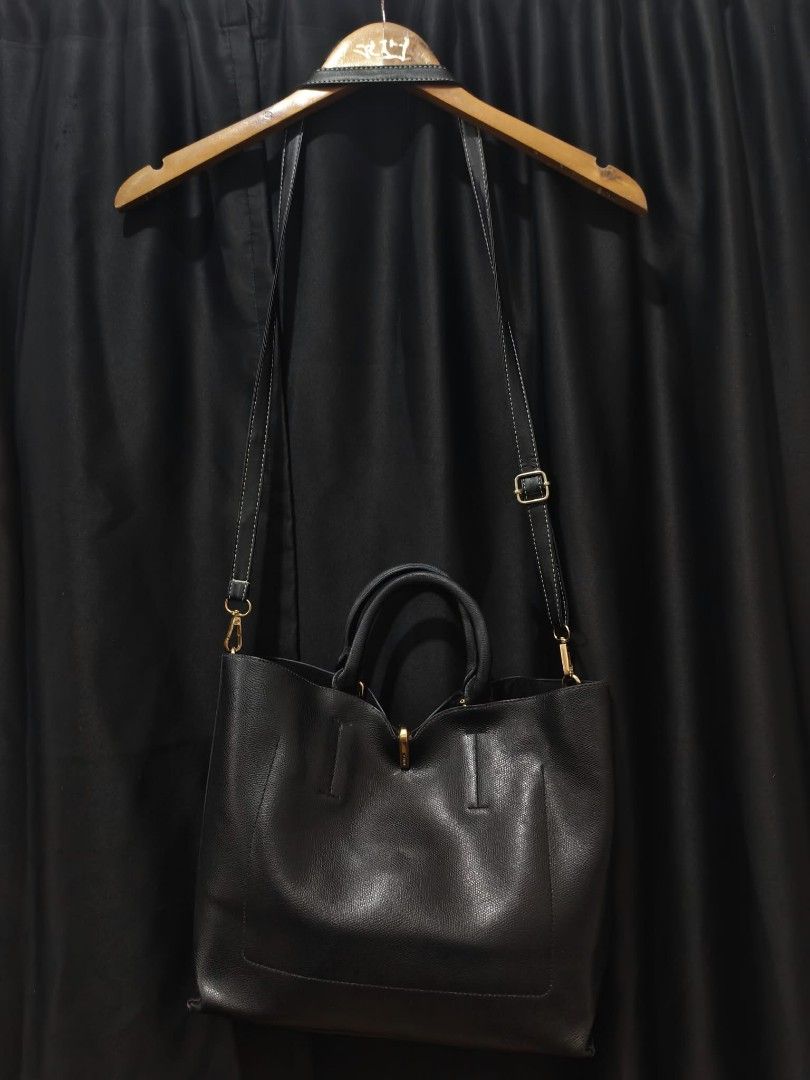 Furla Reversible Multi-Color Tote Handbag (Category: Tote Bags) located in Baguio. Submitted by solo_ukay (Listing ID 1467787325, Image 2). Description: Furla tote bag, multi-color striped design on one side and solid black on the other side. Genuine leather interior tag. Top carry handles plus a detachable, adjustable shoulder strap. Zip pocket inside. Gold-tone hardware. Reversible style gives two looks in one bag..