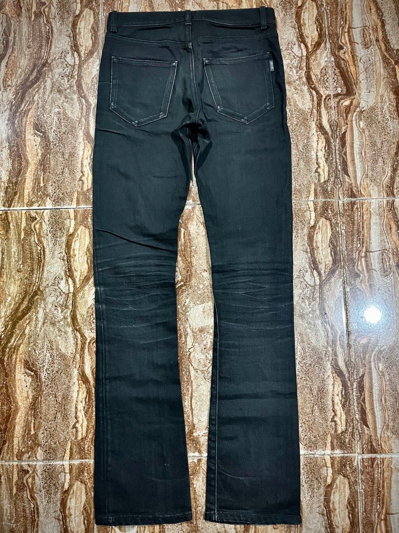 (SOLD) FW2018 SAINT LAURENT D17 BOOTCUT RAW DENIM (Category: Luxury Apparel) located in Cagayan de Oro. Submitted by middlesosa (Listing ID 1467741914, Image 3). Description: FW2018 SAINT LAURENT D17 BOOTCUT RAW DENIM SIZE 27 WAIST - 14.5 inches LENGTH - 43 inches INSEAM - 33 inches LEG OPENING - 7 inches THIGH - 9 inches RISE - 9 inches UNALTERED RUNWAY PIECE MADE IN ITALY BUTTON FLY BEST SLP CUT OAT 30k php.