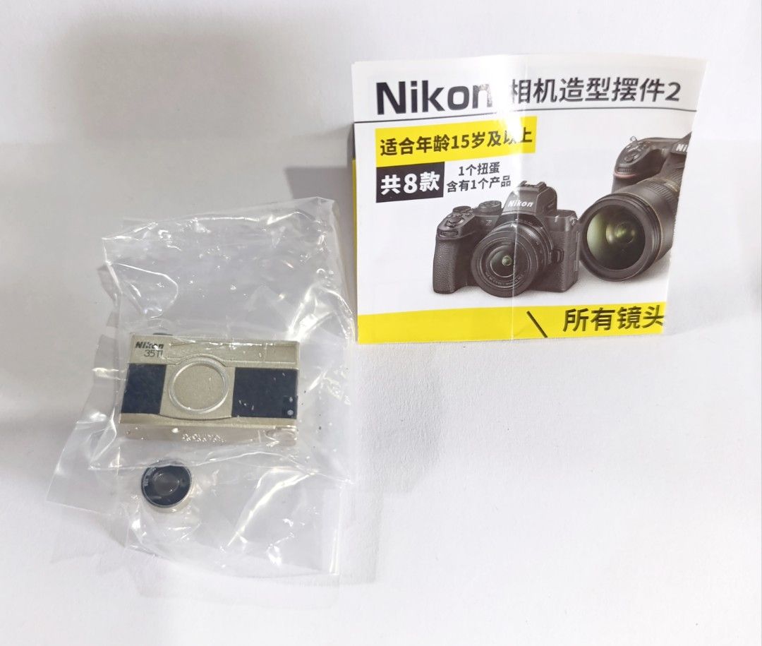 Gachapon Bandai Nikon (Category: Designer & Blind Box Toys) located in Rizal. Submitted by _princess_szarah_ (Listing ID 1467642577, Image 1). Description: Bandai Nikon v2 • Nikon 35Ti - complete inclusion - sealed in plastic - gachapon ball included (** NOT A REAL CAMERA**) ❌ strictly NO CANCELLATION 📍 for SURE BUYER ONLY Loc: Angono Rizal Mop: gcash ; maribank Mod: J&T express (sf shouldered by buyer).