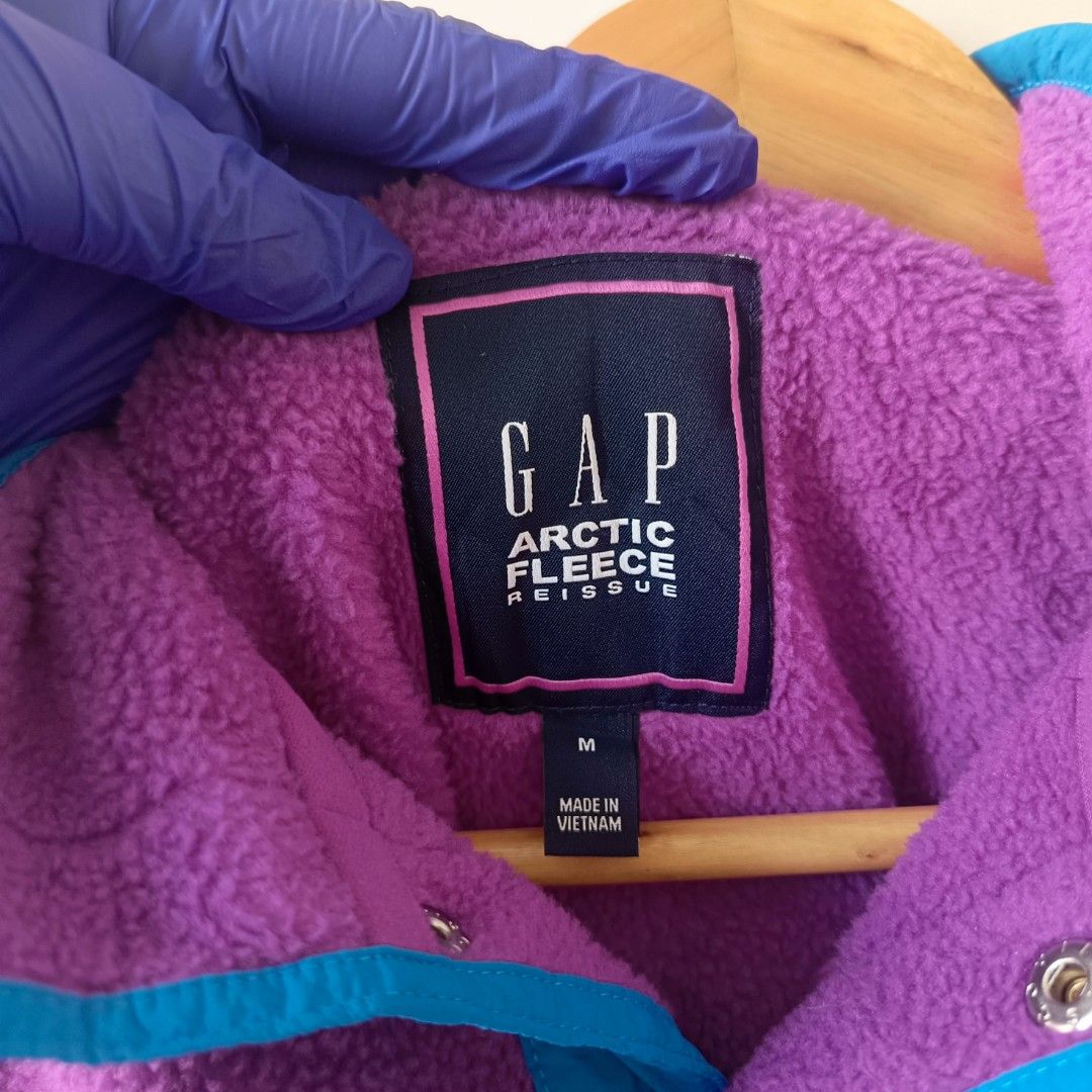 Gap Arctic Fleece Reissue Pullover Fuchsia Shock Size M (Category: Coats, Jackets and Outerwear) located in Manila. Submitted by pdwainn84681 (Listing ID 1467677704, Image 2). Description: - Brand/Style: Gap Arctic Fleece Reissue Pullover - Size: Medium - Color: Fuchsia Shock Purple with Bright Blue contrast trim - Material: Super cozy, textured fleece - Features: Snap placket, stand collar, flap chest pocket - Details: Classic retro mountain gra