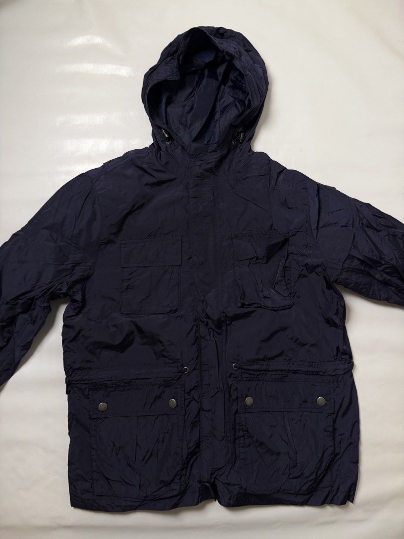Gap Navy Blue Hooded Utility Jacket Size L (Category: Hoodies) located in Gapan. Submitted by rasthriftshop (Listing ID 1467805157, Image 1). Description: GAP Windbreaker Size on tag: L Dimes: 24 x 29 ₱500 + sf Condition: Excellent Color rate: 9/10 Issue: None.