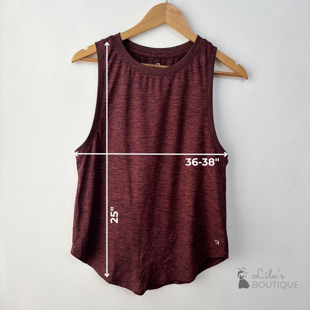 GapFit Brushed Tech Jersey Tank Top (Category: Activewear) located in San Fernando. Submitted by lilasboutique (Listing ID 1467630852, Image 2). Description: Size: SMALL (S) Chest: 36-38 in | Length: 25 in Fit: Regular • Good Condition. No issues • Brand: Gap • Color: Maroon • Material: Brushed Tech Jersey • Tagged as Small but can fit Medium to Large.