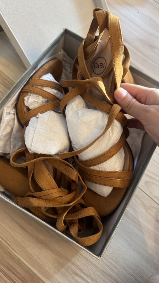 Gibi Galilee Tan Suede Block Heel Sandals Size 38 (Category: Heels) located in Makati City. Submitted by declutter_forsale (Listing ID 1467690804, Image 3). Description: - Brand: Gibi (Model: Galilee) - Color/Material: Tan suede - Size: 38 - Style: Chunky block heel with strappy wrap-around ankle ties - Condition: Brand new, never worn outside (only minor sole wear from indoor try-ons) - Inclusion: Original box included.