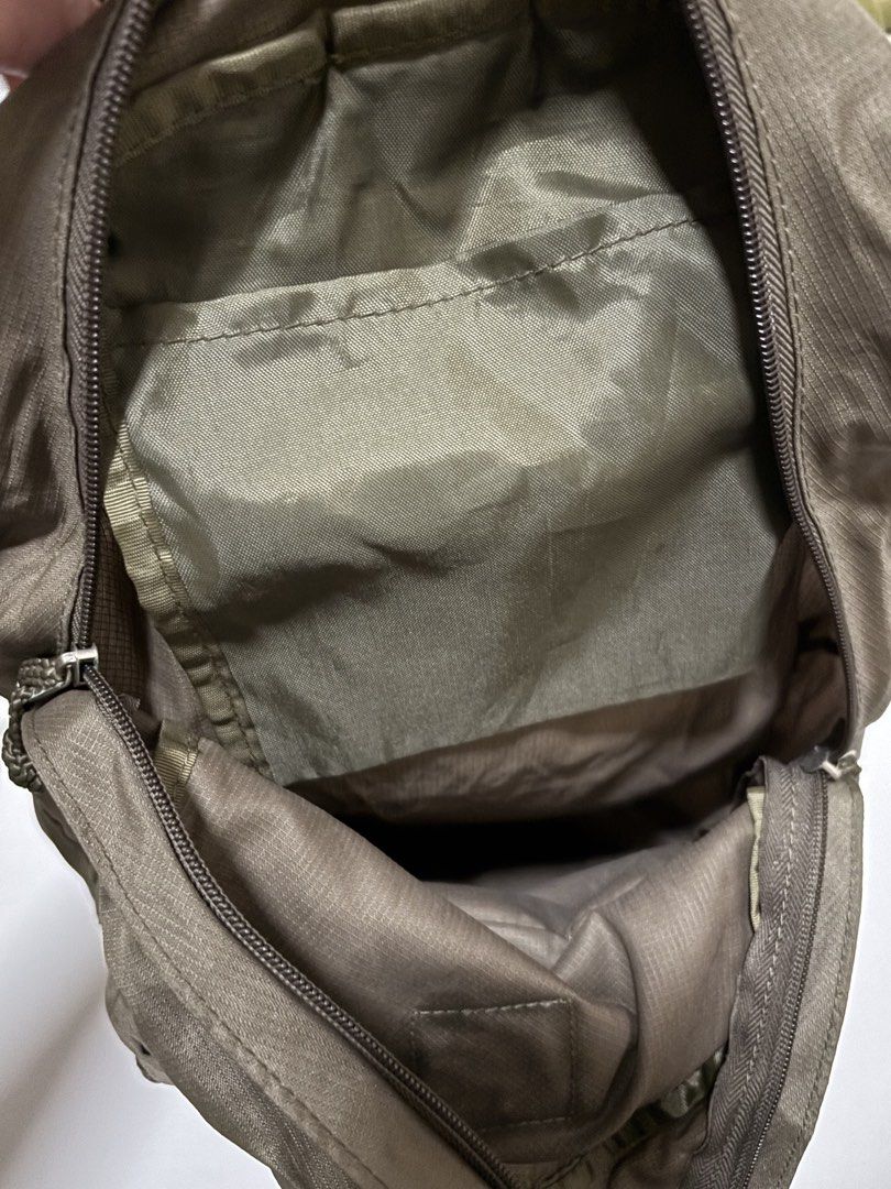 Giordano Athletic Packable Olive Green Backpack (Category: Backpacks) located in Quezon City. Submitted by leahs.stuff (Listing ID 1467730688, Image 3). Description: - Brand: Giordano Athletic - Color: Olive green - Packable design: Folds completely into its own compact pouch for easy travel and storage - Storage: Main compartment with internal sleeve and front zippered pocket with logo patch - Comfort: Adjustable shoulder straps - Material: Dura