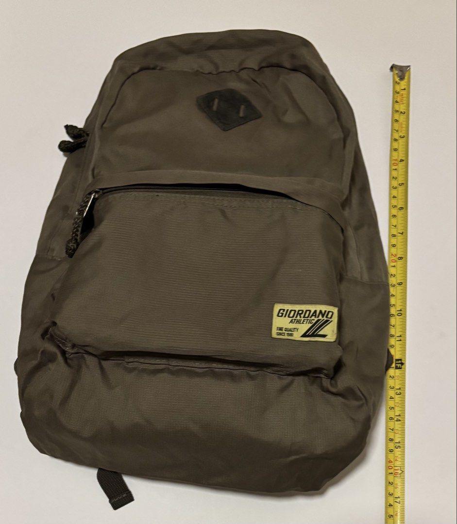 Giordano Athletic Packable Olive Green Backpack (Category: Backpacks) located in Quezon City. Submitted by leahs.stuff (Listing ID 1467730688, Image 1). Description: - Brand: Giordano Athletic - Color: Olive green - Packable design: Folds completely into its own compact pouch for easy travel and storage - Storage: Main compartment with internal sleeve and front zippered pocket with logo patch - Comfort: Adjustable shoulder straps - Material: Dura