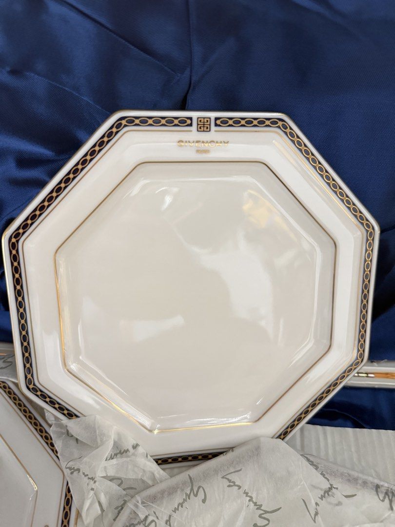 Givenchy La Porcelaine Octagonal Porcelain Plate Set (Category: Dinnerware & Cutlery) located in Manila. Submitted by preciousma24494 (Listing ID 1467674531, Image 3). Description: - Brand: Givenchy La Porcelaine (crafted by Yamaka) - Design: Elegant octagonal white porcelain with gold trim and blue geometric border - Condition: Brand new, never used, pristine condition - Inclusions: Original presentation box with luxurious blue satin lining and 