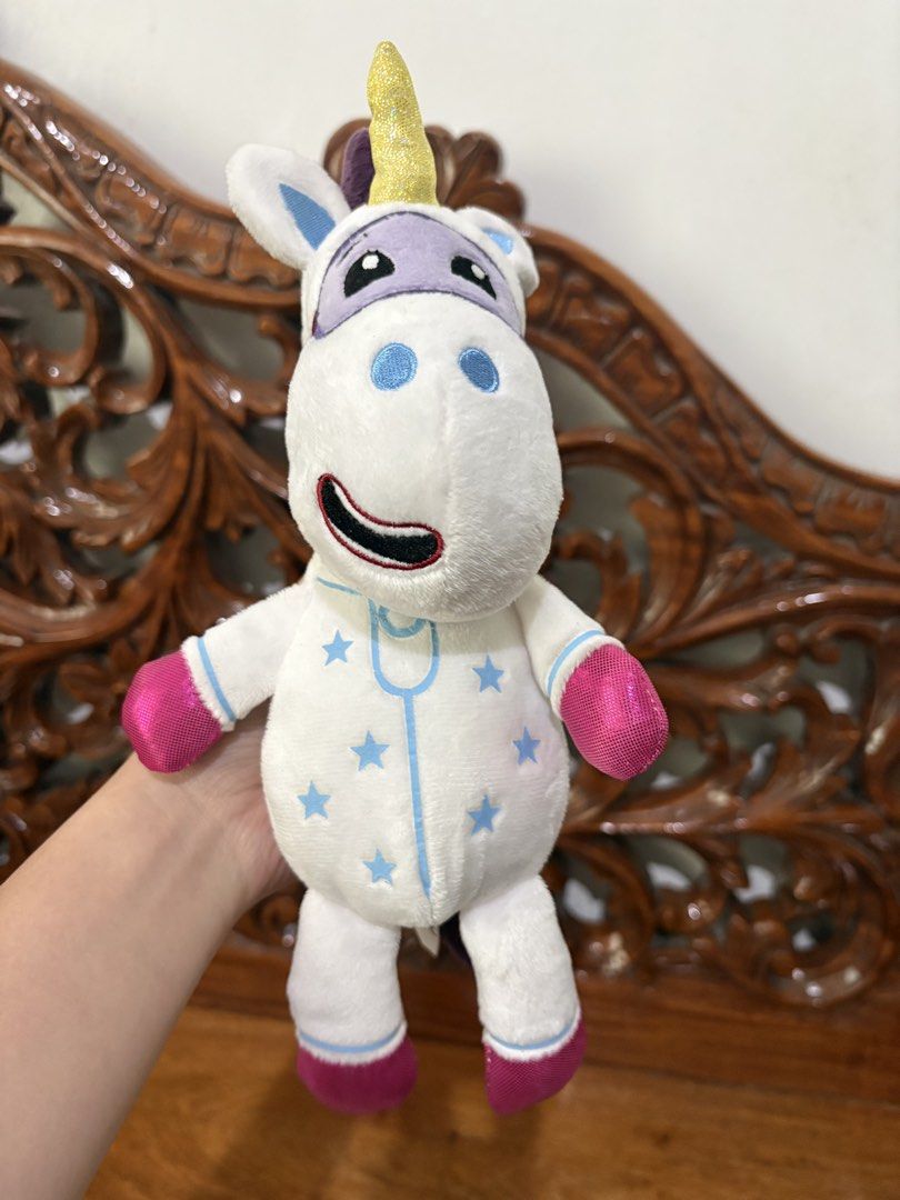 Go Jetters Unicorn Plush Toy (Category: Plushies & Soft Toys) located in Quezon City. Submitted by rxyel (Listing ID 1467659282, Image 2). Description: - Official Go Jetters unicorn plush toy with authentic BBC tag - Features a white body with a cute blue star pattern - Sparkly gold horn and shiny pink hooves/muzzle details - Vibrant purple mane on the back - Clean fabric and soft stuffing, very well-maintained.