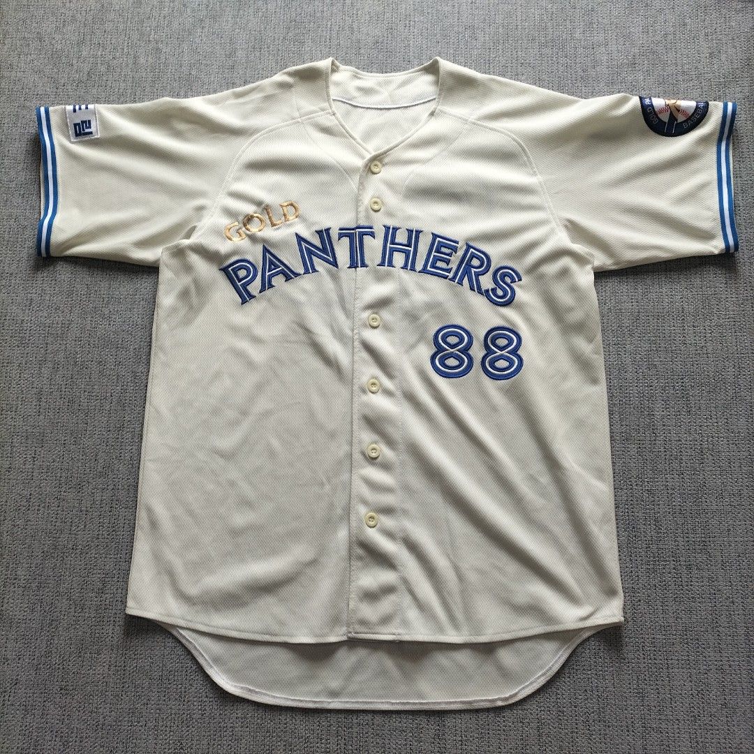 Gold Panthers Baseball Team Jersey Off-White Size 105 (Category: Activewear) located in Taytay. Submitted by calmtree-6248 (Listing ID 1467638424, Image 1). Description: - Style: Off-white Gold Panthers baseball jersey with button-down front - Number: 88 on the front - Details: Embroidered team logo patch on the sleeve - Cuffs: Blue and white sleeve cuffs - Size: 105 tag attached - Material: Breathable mesh fabric - Length: Approximately 29 to 32