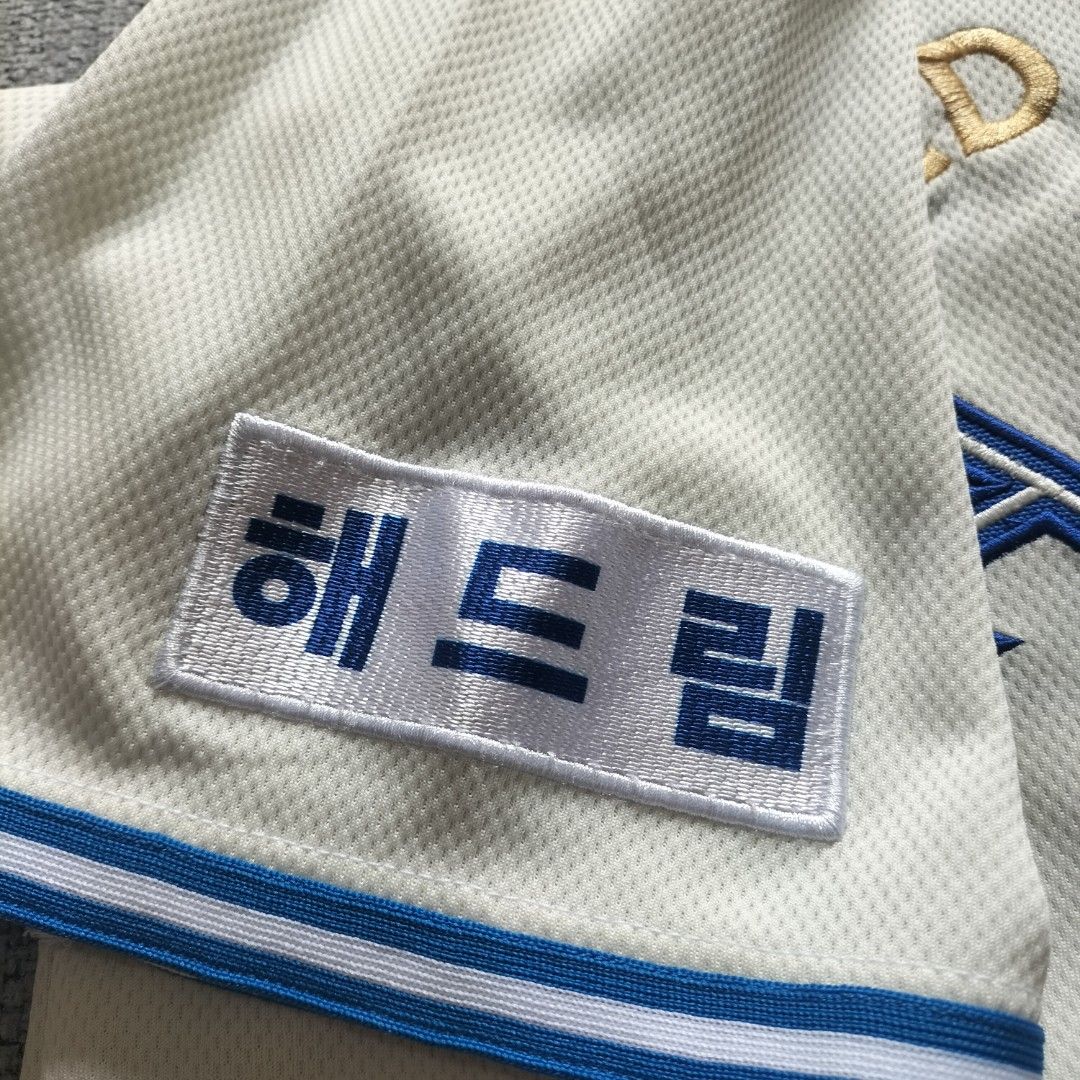Gold Panthers Baseball Team Jersey Off-White Size 105 (Category: Activewear) located in Taytay. Submitted by calmtree-6248 (Listing ID 1467638424, Image 3). Description: - Style: Off-white Gold Panthers baseball jersey with button-down front - Number: 88 on the front - Details: Embroidered team logo patch on the sleeve - Cuffs: Blue and white sleeve cuffs - Size: 105 tag attached - Material: Breathable mesh fabric - Length: Approximately 29 to 32