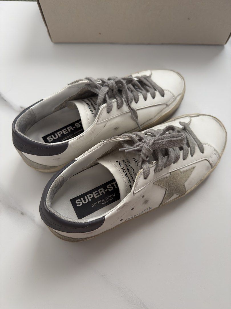 Golden Goose Super-Star White Grey tab - COMPLETE/FULL SET (Category: Sneakers) located in Los Banos. Submitted by jellybeeeans (Listing ID 1467651259, Image 3). Description: Size 39eu Authentic with store receipt! bought it for 699,999 KRW or 32,xxx Php Worn once! Fits 8-9US wmns Comes complete—with box, dustbag, passport, receipt and paper bag Rfs: not my size, getting a bigger pair.
