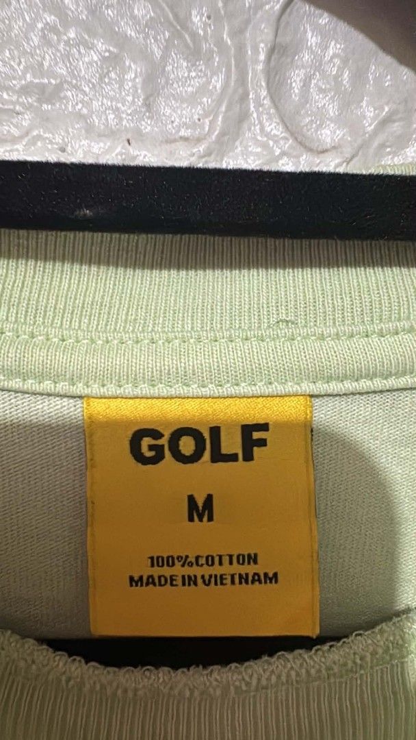Golf Wang Green GOLF Logo T-Shirt Medium (Category: Tshirts & Polo Shirts ) located in Manila. Submitted by grandwater.53a8ce (Listing ID 1467667490, Image 3). Description: Green Golf Wang tee with white and green GOLF logo across the chest. Size medium tag inside the collar, made of 100% cotton in Vietnam. Machine wash cold, hang dry instructions on the inner yellow tag. Standard crew neck short sleeve streetwear piece from Tyler the Creator's b