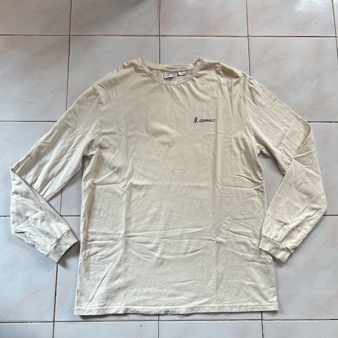 Gramicci El Capitan Long Sleeve 🥵 (Category: Tshirts & Polo Shirts ) located in Jinoba-an. Submitted by eegiboy (Listing ID 1467649266, Image 1). Description: - Authentic Gramicci long sleeve tee in a versatile cream colorway - Small signature running man logo on the left chest - Eye-catching large El Capitan climbing route graphic printed on the back - Classic crew neck design with comfortable ribbed cuffs - Made from soft, comfortable cotton f