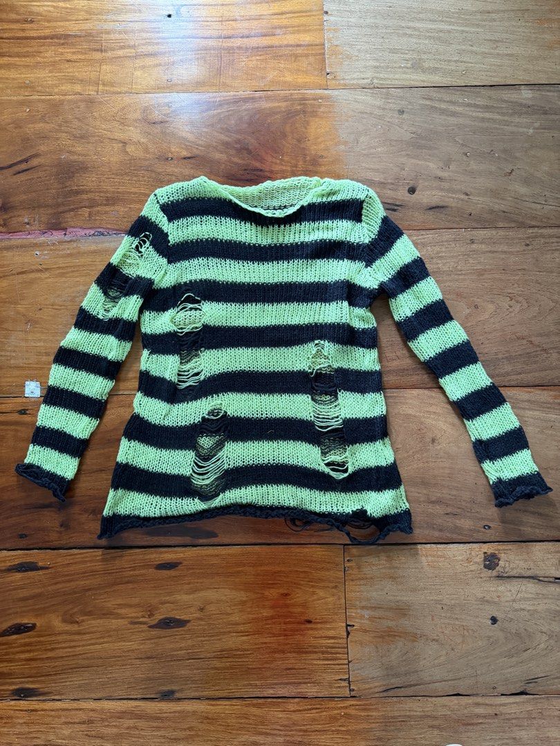 Green and Black Striped Knitted Sweater (Category: Longsleeves) located in Caloocan City. Submitted by olimijme (Listing ID 1467621732, Image 3). Description: Green and Black Striped Knitted Sweater -used for Buttercup cosplay -like new -soft -fits size S - M Shipping through Lalamove or Grab only, fee to be shouldered by buyer.