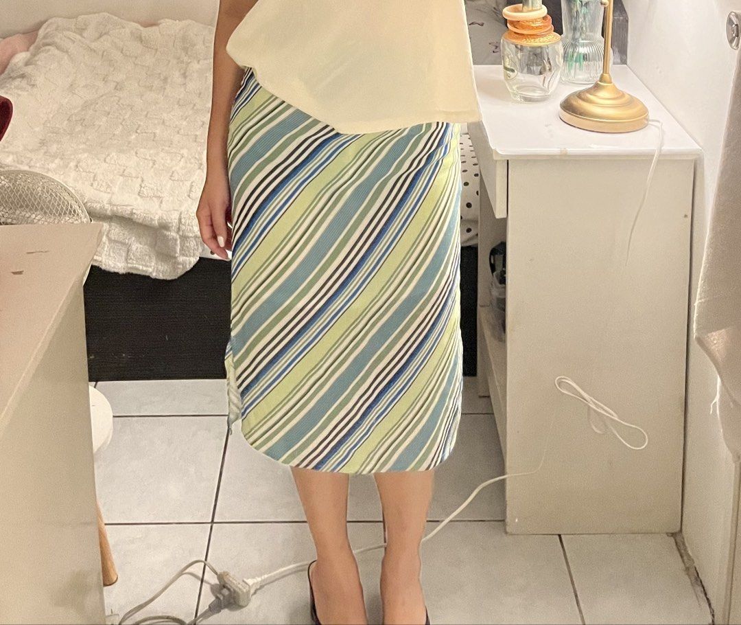Green Blue Striped Midi Skirt (Category: Skirts) located in Quezon City. Submitted by bae.randa (Listing ID 1467382197, Image 1). Description: midi skirt with a chic side slit Size: W13 L24.5.