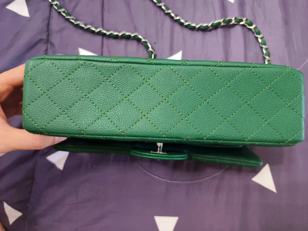 Green Quilted Leather Chain Shoulder Bag (Category: Shoulder Bags) located in Manila. Submitted by ice_icegadgets (Listing ID 1466204776, Image 3). Description: - Color: Emerald Green - Material: Quilted Leather - Hardware: Silver - Closure: Classic CC turn-lock on front flap - Strap: Intertwined chain and leather shoulder strap (Green & Silver) - Inclusions: Black authentication card with serial number 10218184 - Design: Structured quilted patte