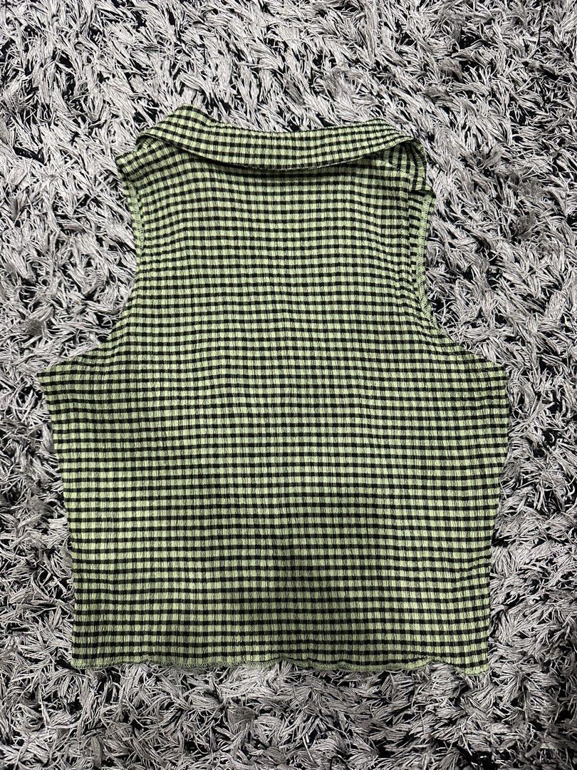 green sleeveless button up (Category: Sleeveless) located in Marikina City. Submitted by bxllaxox (Listing ID 1467751284, Image 2). Description: -buyer must shoulder the shipping.