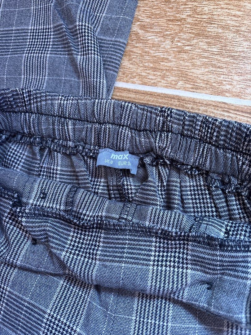 Grey Plaid Wide Leg Pants (Category: Other Bottoms) located in Manila. Submitted by _foryou (Listing ID 1467666559, Image 2). Description: - Brand/Style: Max grey plaid/tartan wide leg pants - Size: UK 8 / EUR 36 - Waist: High-waisted with a comfy elastic back - Details: Chic decorative black buttons on both sides - Versatility: Easy to dress up for the office or down for casual weekends.