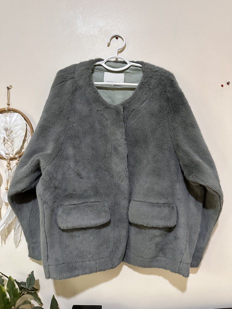 Greyish Soft Fur Coat for Winter (Category: Coats, Jackets and Outerwear) located in Manila. Submitted by eltums (Listing ID 1467693564, Image 2). Description: Soft fur winter jacket Good as new Only worn once Best fits L TO XL.