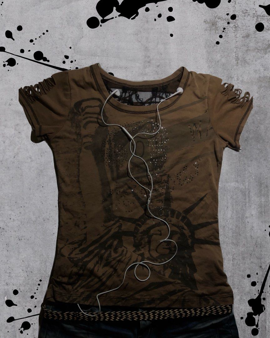 Grunge Edgy Y2K Brown Graphic Tee (Category: Shirts) located in Calamba. Submitted by kiyanc3 (Listing ID 1467802282, Image 2). Description: Issue: Missing Rhinestones ( Not Obvious ) - Size Small to Medium - Body Fit - Cotton-Blend Jersey .