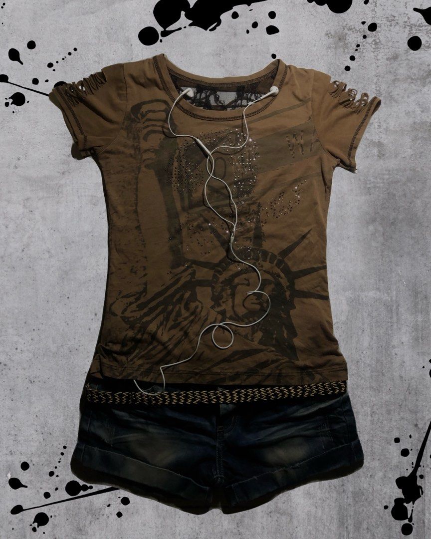 Grunge Edgy Y2K Brown Graphic Tee (Category: Shirts) located in Calamba. Submitted by kiyanc3 (Listing ID 1467802282, Image 1). Description: Issue: Missing Rhinestones ( Not Obvious ) - Size Small to Medium - Body Fit - Cotton-Blend Jersey .