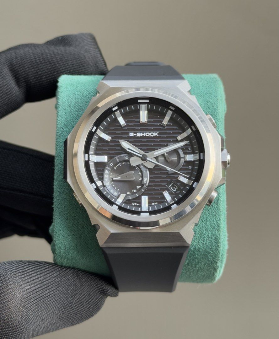 Gshock G-Steel GST-B1000 (Category: Men's Watches) located in Pasig City. Submitted by kjeldran00 (Listing ID 1467681145, Image 1). Description: Gshock G-Steel GST-B1000 Condition: 9.8/10 (1 Month Old) Inclusions: Outer Box, Watch Box, Hangtag, Manual, Warranty Card, and Receipt Specifications: Solar powered Case Material: Stainless steel Case Diameter: 44mm Case Thickness: 11.6mm Water Resistance: 200m Bluetooth: Connects to a smartphone and aut