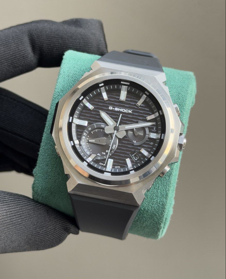 Gshock G-Steel GST-B1000 (Category: Men's Watches) located in Pasig City. Submitted by kjeldran00 (Listing ID 1467681145, Image 2). Description: Gshock G-Steel GST-B1000 Condition: 9.8/10 (1 Month Old) Inclusions: Outer Box, Watch Box, Hangtag, Manual, Warranty Card, and Receipt Specifications: Solar powered Case Material: Stainless steel Case Diameter: 44mm Case Thickness: 11.6mm Water Resistance: 200m Bluetooth: Connects to a smartphone and aut