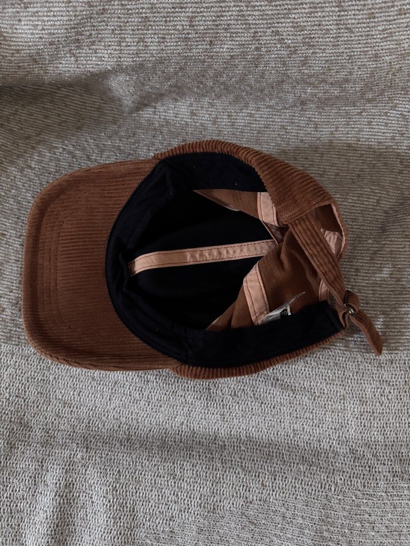 GU Corduroy Baseball Cap Brown (Category: Hats & Beanies) located in Marikina City. Submitted by switkimchi (Listing ID 1467635344, Image 2). Description: - Brand: GU - Material: 100% cotton corduroy with textured wale fabric - Color: Brown - Design: Classic six-panel cap with black inner sweatband - Closure: Adjustable strap with metal clasp (fits most head sizes) - Condition: Clean inside and out - Style: Great everyday cap for autumn and winte