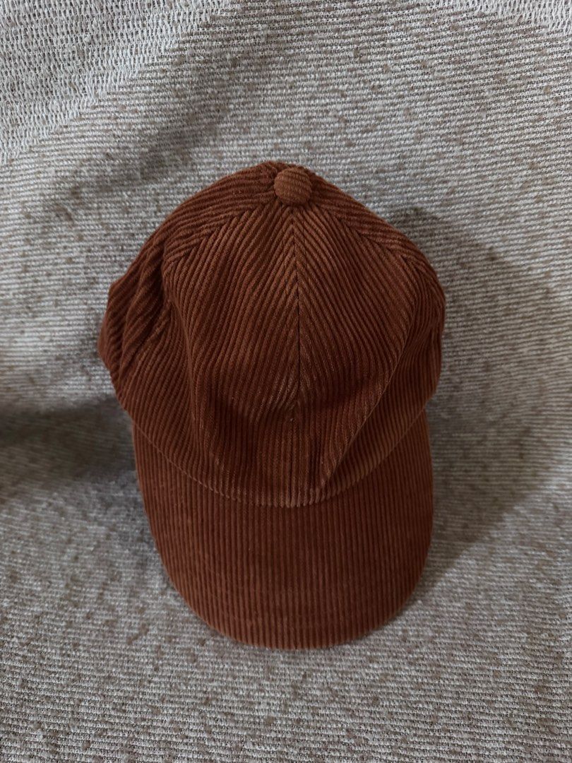 GU Corduroy Baseball Cap Brown (Category: Hats & Beanies) located in Marikina City. Submitted by switkimchi (Listing ID 1467635344, Image 1). Description: - Brand: GU - Material: 100% cotton corduroy with textured wale fabric - Color: Brown - Design: Classic six-panel cap with black inner sweatband - Closure: Adjustable strap with metal clasp (fits most head sizes) - Condition: Clean inside and out - Style: Great everyday cap for autumn and winte