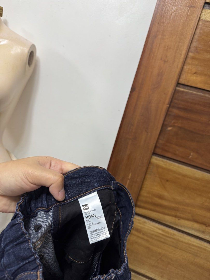 GU Denim Jeans Size M 150 (Category: Jeans) located in Cavite. Submitted by yakultjeni85475 (Listing ID 1467713846, Image 2). Description: - Brand: GU - Color: Dark blue denim - Size: M 150 - Material: 100% cotton (with recycled fibers) - Waistband: Elastic in the back with belt loops - Closure: Front button - Pockets: Two back pockets - Details: Stylish contrast stitching throughout.