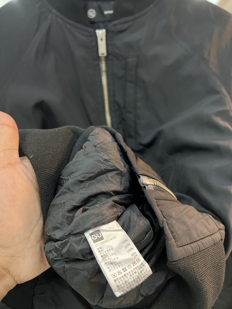 GU x UNDERCOVER Black Bomber Jacket (Category: Coats, Jackets and Outerwear) located in Baguio. Submitted by thrash2cash_2600 (Listing ID 1467702468, Image 3). Description: - Brand: GU x UNDERCOVER collaboration - Item: Bomber jacket - Color: Black - Size: Small - Condition: Brand new with tags attached - Details: Full zip front with branded metal pull, snap-button front pockets, sleeve utility pocket, ribbed collar and hem.