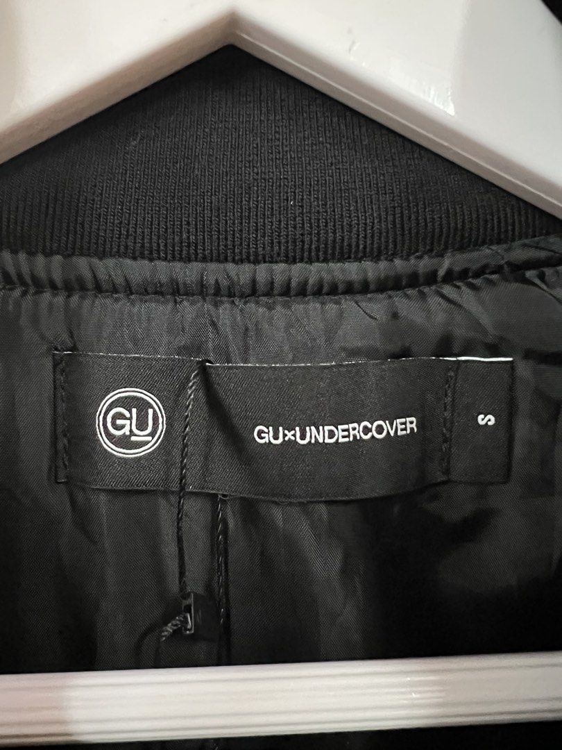 GU x UNDERCOVER Black Bomber Jacket (Category: Coats, Jackets and Outerwear) located in Baguio. Submitted by thrash2cash_2600 (Listing ID 1467702468, Image 2). Description: - Brand: GU x UNDERCOVER collaboration - Item: Bomber jacket - Color: Black - Size: Small - Condition: Brand new with tags attached - Details: Full zip front with branded metal pull, snap-button front pockets, sleeve utility pocket, ribbed collar and hem.