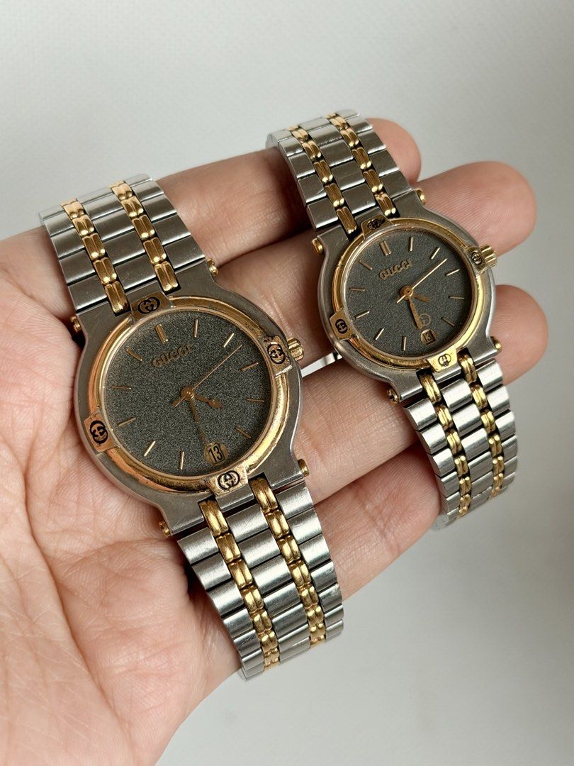 Gucci 9000M 9000L (Category: Men's Watches) located in Manila. Submitted by vibeandvintage (Listing ID 1467777057, Image 1). Description: ⌚️ Gucci 9000L and Gucci 9000M •His and Hers •Quartz movement •Dark grey textured dial •Two-tone stainless steel and gold-tone •25mm case diameter for women’s and 32mm for men’s (excluding crown) •Men’s - up to 7.2 inches wrist size •Women’s - up to 6.3 inches wrist size •Original watch head and bracelet •With 