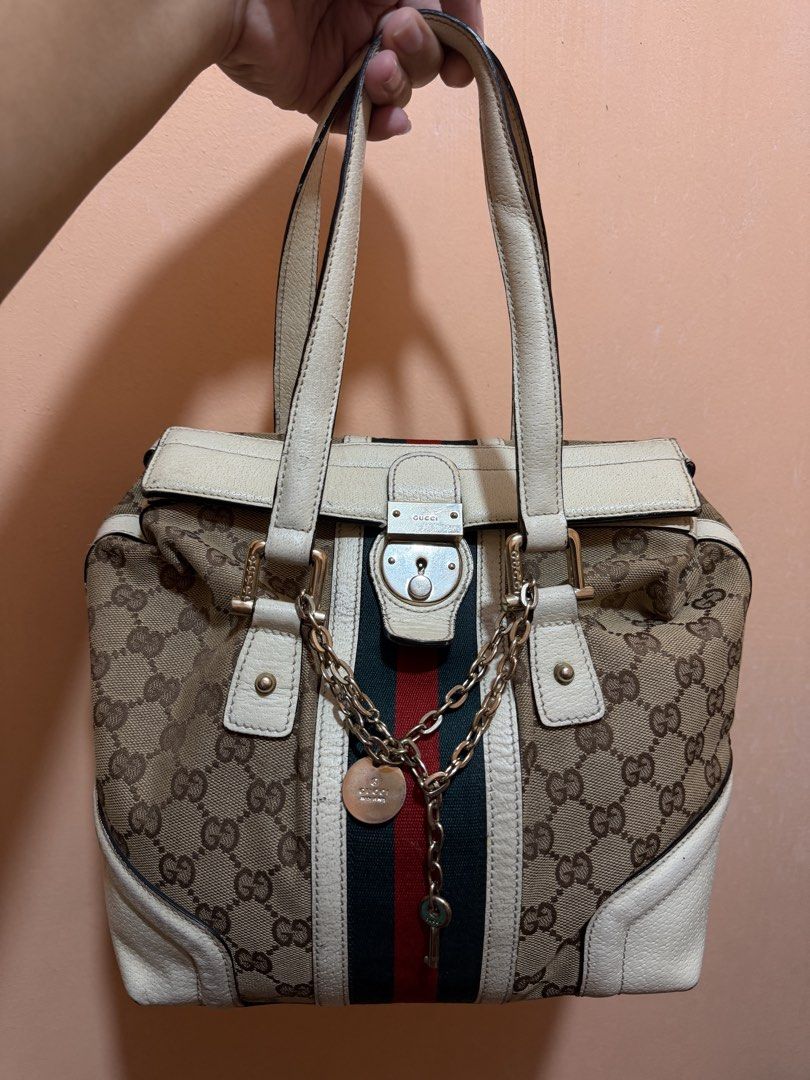 Gucci Treasure Boston Bag (Category: Shoulder Bags) located in Las Pinas. Submitted by fromlolita (Listing ID 1467741009, Image 1). Description: Gucci Treasure Boston Bag Sign of usage but not noticable Kindly self authenticate.