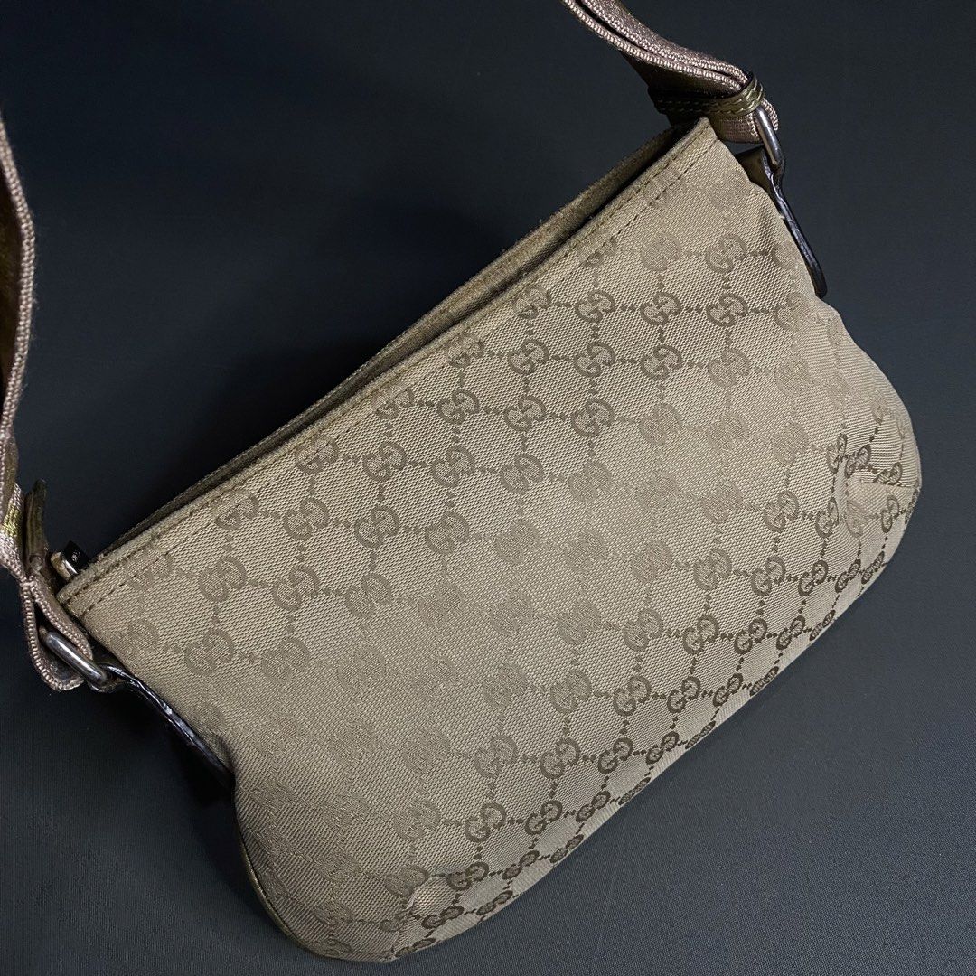 Gucci Canvas Sling Bag (Category: Sling Bags) located in Cavite. Submitted by lit_loots (Listing ID 1467790321, Image 3). Description: Excellent condition Signs of usage only Coded.