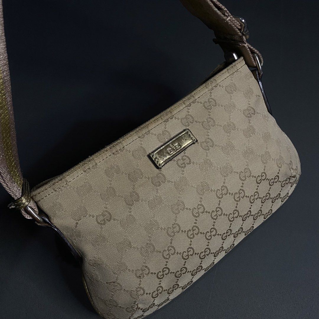 Gucci Canvas Sling Bag (Category: Sling Bags) located in Cavite. Submitted by lit_loots (Listing ID 1467790321, Image 2). Description: Excellent condition Signs of usage only Coded.