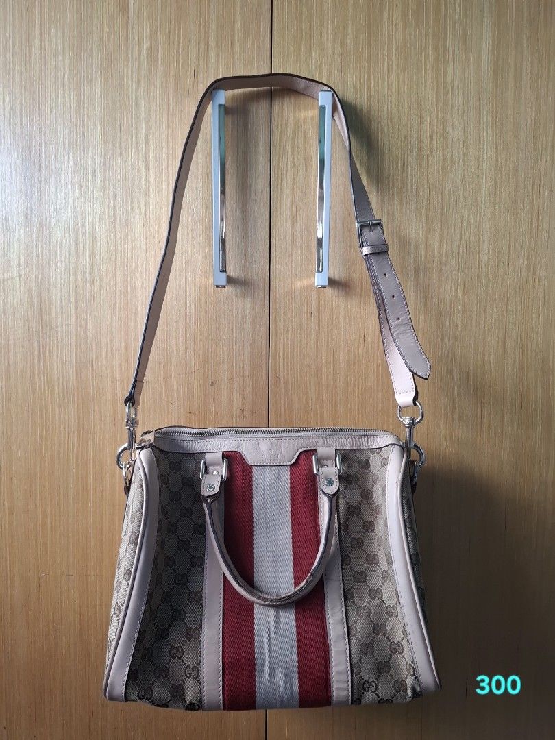 Gucci GG Supreme Canvas Web Tote Handbag (Category: Tote Bags) located in Pasay City. Submitted by emilia1102 (Listing ID 1467792327, Image 1). Description: -Gucci monogram canvas tote bag - Eye-catching red and white web stripe down the middle - Elegant pale pink leather trim and double top handles - Includes an adjustable and detachable shoulder strap for crossbody or shoulder wear - Secure zip-top closure - Spacious interior with plenty of roo