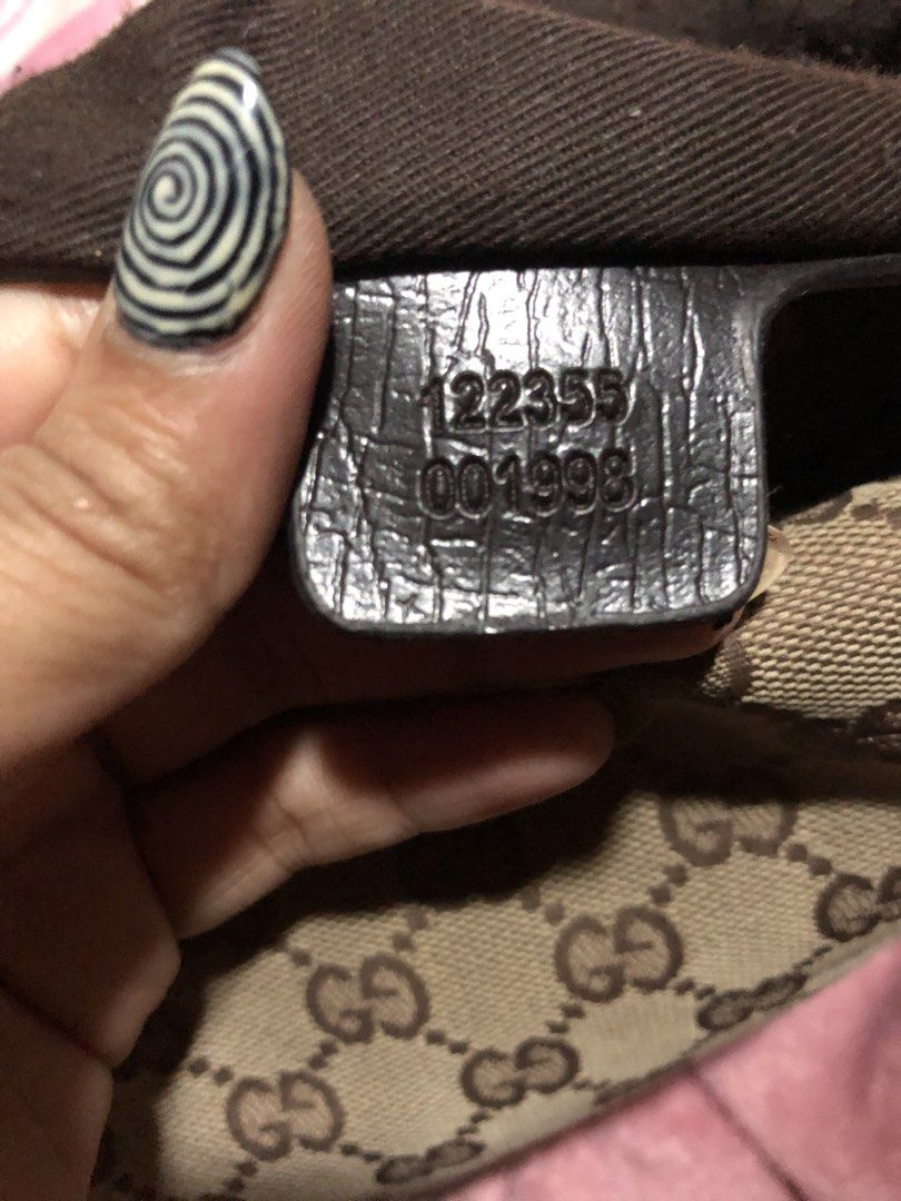 Gucci Monogram Canvas Shoulder Bag (Category: Luxury Bags & Wallets) located in Quezon City. Submitted by narajajennyrose (Listing ID 1467793321, Image 2). Description: Make an offer Pm for details - Authentic Gucci shoulder bag in classic beige/brown monogram canvas - Features dark brown leather strap and sleek silver-tone hardware - Secure top zip closure for everyday use - Clean fabric-lined interior with a handy pocket - Includes stamped inte