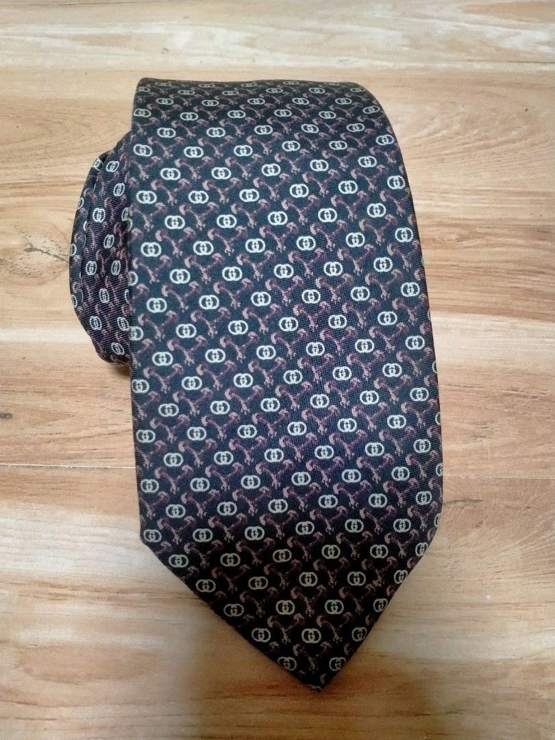 GUCCI NECKTIE (Category: Ties) located in Cabuyao City. Submitted by Bike_Clothing10 (Listing ID 1467609520, Image 1). Description: READ FIRST... FOR SALE: GUCCI NECKTIE Excellent Condition Looks New Made in Italy PRICE: 1350 Free Shipping (J&T) PICK UP OR SHIPPING ONLY LOCATION: Cabuyao Laguna -NO COD/COP- 📩PM -Thanks-.