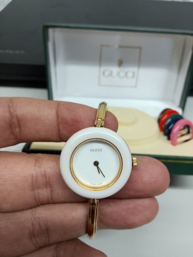 Gucci watch (Category: Women's Watches) located in Quezon City. Submitted by myke0377 (Listing ID 1467698987, Image 2). Description: preloved Gucci bangle in good condition original po un watch and bezel size small to medium with 11 rings bezel with replement box. pwde meet up QC or Manila area lang po..