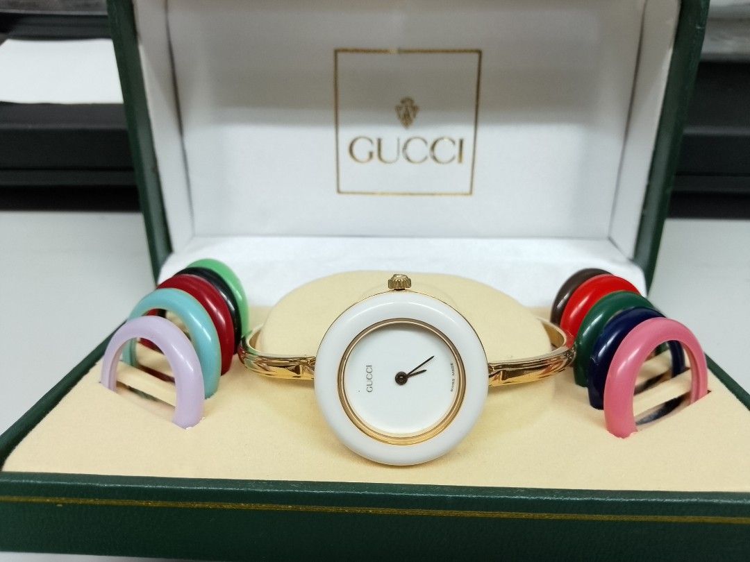 Gucci watch (Category: Women's Watches) located in Quezon City. Submitted by myke0377 (Listing ID 1467698987, Image 1). Description: preloved Gucci bangle in good condition original po un watch and bezel size small to medium with 11 rings bezel with replement box. pwde meet up QC or Manila area lang po..