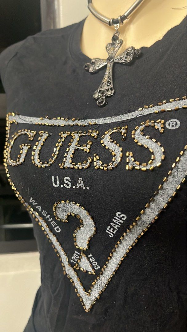 Guess big logo sequins tee (Category: Shirts) located in Caloocan City. Submitted by onlyfromthepast (Listing ID 1467719066, Image 2). Description: 9/10 condition Small ✅My bio before purchasing tia💕 ✅ All items are fresh from bales, Pls expect dirt,dust or stains.