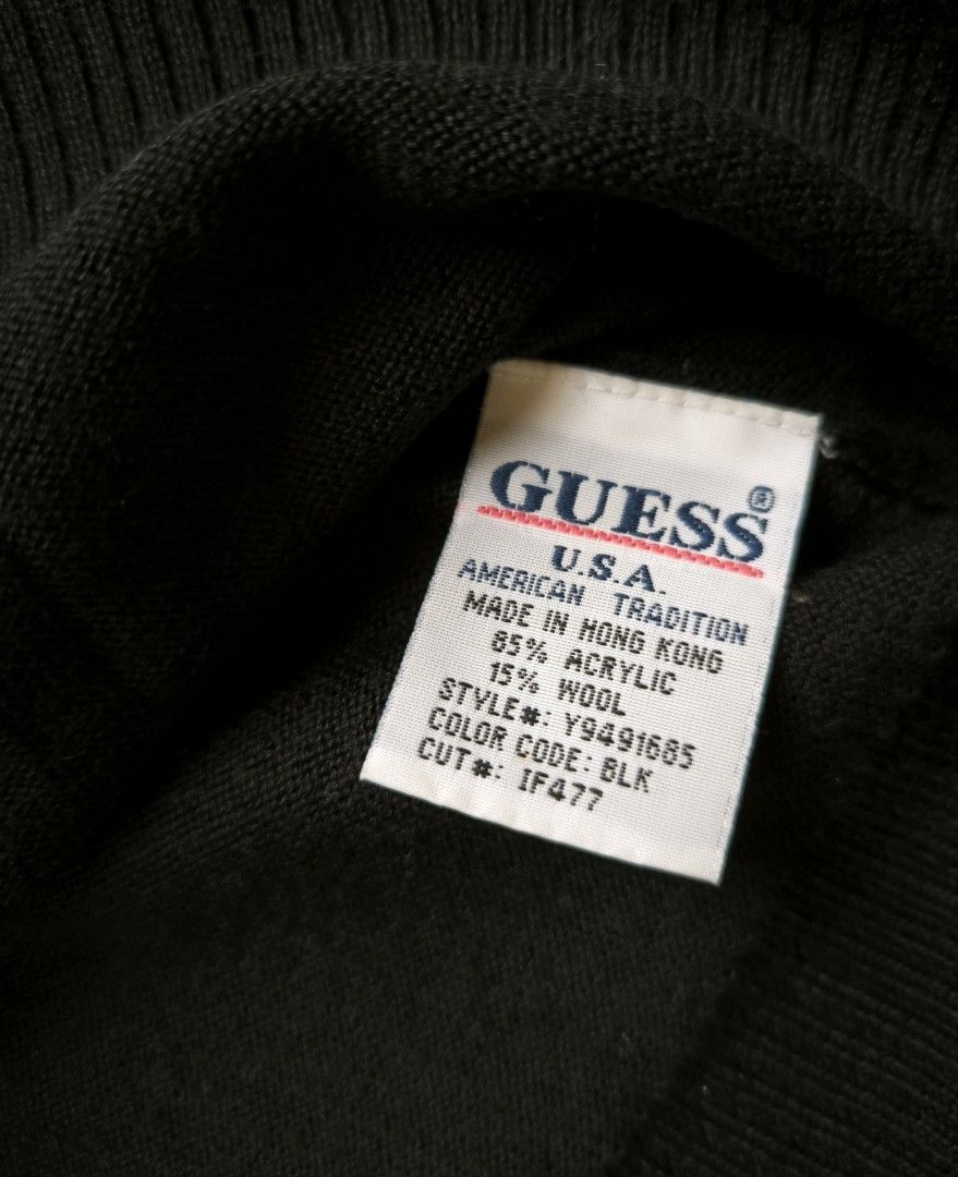 Guess black cardigan (Category: Longsleeves) located in Manila. Submitted by wearforce (Listing ID 1467754429, Image 1). Description: Guess black cardigan fit: M-L good condition color rate 9/10 249 + sf.