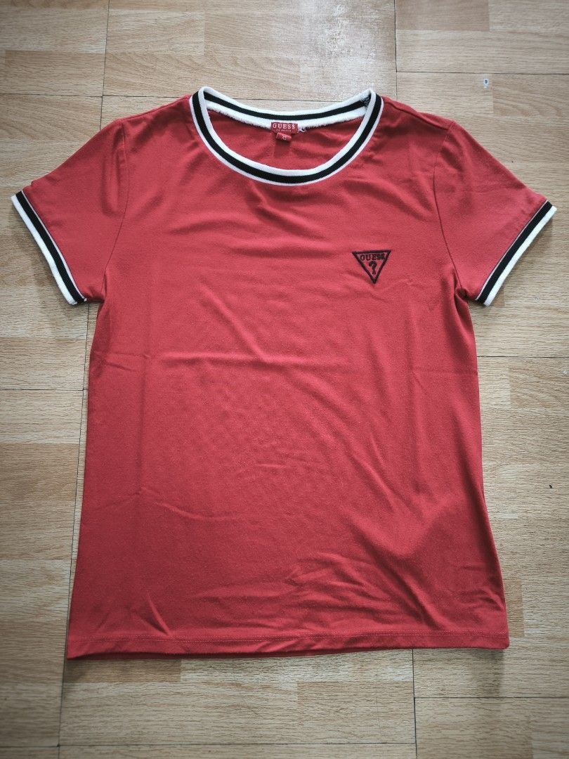 Guess red shirt (Category: Shirts) located in Manila. Submitted by wearforce (Listing ID 1467765574, Image 1). Description: Guess red shirt fit: small good condition color rate 10/10 349 + sf.