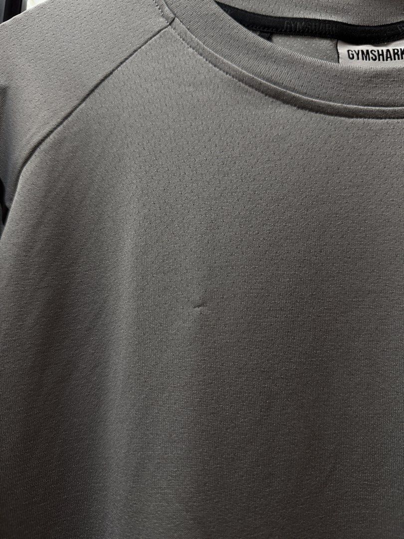 Gymshark dri fit tee (Category: Activewear) located in Manila. Submitted by affarni (Listing ID 1467782567, Image 3). Description: Like new. Has minor factory flaw (last pic) Size XL 21x29 measurements Php 900.