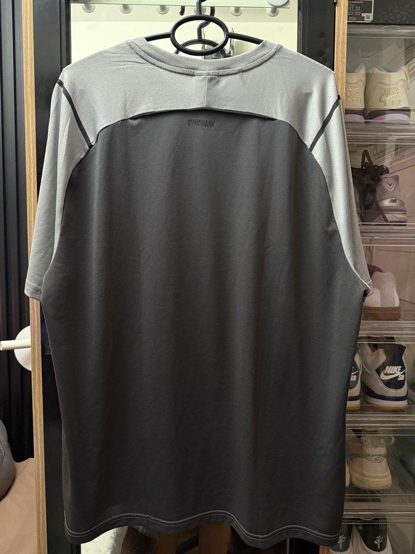 Gymshark dri fit tee (Category: Activewear) located in Manila. Submitted by affarni (Listing ID 1467782567, Image 2). Description: Like new. Has minor factory flaw (last pic) Size XL 21x29 measurements Php 900.