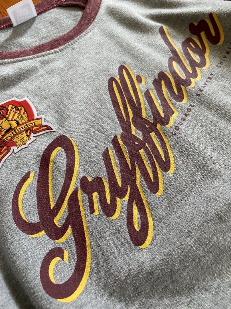 Harry Potter Gryffindor oversized sweatshirt (Category: Coats, Jackets and Outerwear) located in Manila. Submitted by ysaa.sj (Listing ID 1467629714, Image 3). Description: - printed and embroidered design - unisex .