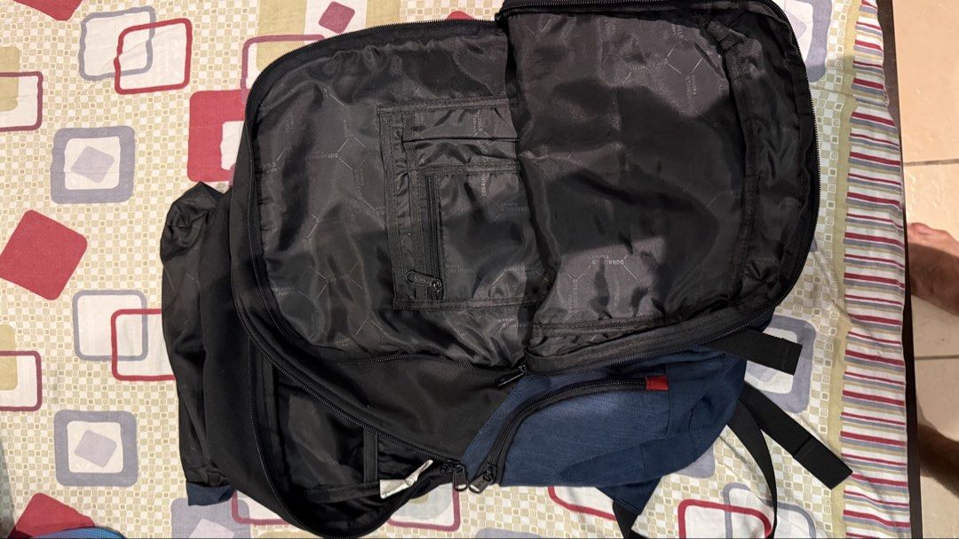 Hawk Backpack Blue Black EST 1978 (Category: Backpacks) located in Quezon City. Submitted by kobeeeee_12 (Listing ID 1467736955, Image 2). Description: - Brand: Hawk - Color: Blue and black with striking red accents - Storage: Multiple interior compartments with a secure zippered pocket - Closure: Front buckle closures with fully adjustable straps - Comfort: Padded shoulder straps for all-day comfort - Interior: Durable fabric lining - Best for: 