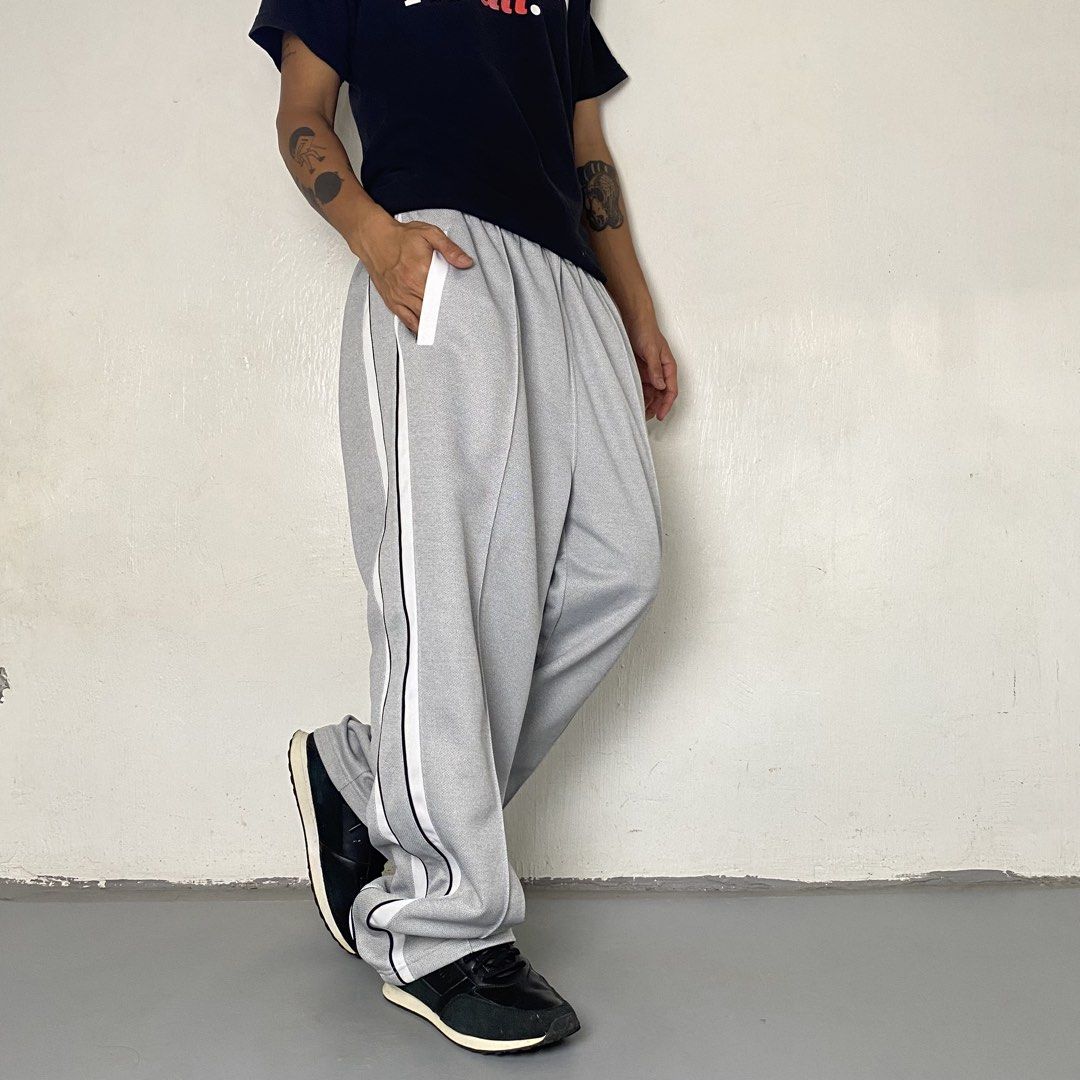 HEAD Light 👞| Light Gray Vintage Track Pants (Category: Joggers) located in Bulacan. Submitted by orc.ph (Listing ID 1467714275, Image 3). Description: HEAD Light 👞| Light Gray Vintage Track Pants Material Used: 100% Polyester -Japan -Straight-Leg Cut -Vintage -Center Pleats -Mid-To-High Rise -Gartered Waistband -Internal Drawchord -Embroidered HEAD Logo -Black And White Side Stripe -Standard Dual Side Slip Pocket -Retro Athleisure Fit -Casual 