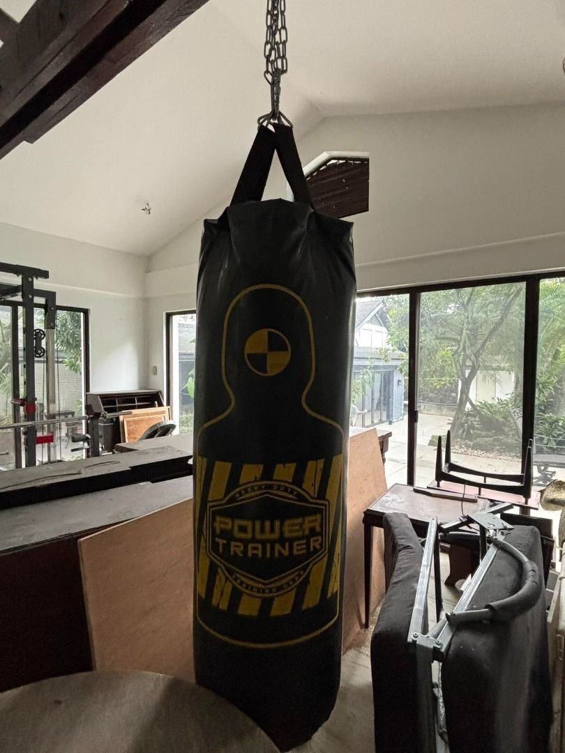 Heavy Duty Boxing Punching Bag (Category: Combat Sports) located in Taytay. Submitted by airamgarcia (Listing ID 1467697956, Image 1). Description: Description: Durable heavy-duty hanging punching bag for boxing, MMA, Muay Thai, and home fitness workouts. Features a target silhouette graphic on the front for strike accuracy training. Includes top nylon hanging straps, sturdy D-rings, and heavy steel hanging chains ready to mount to a ceiling beam