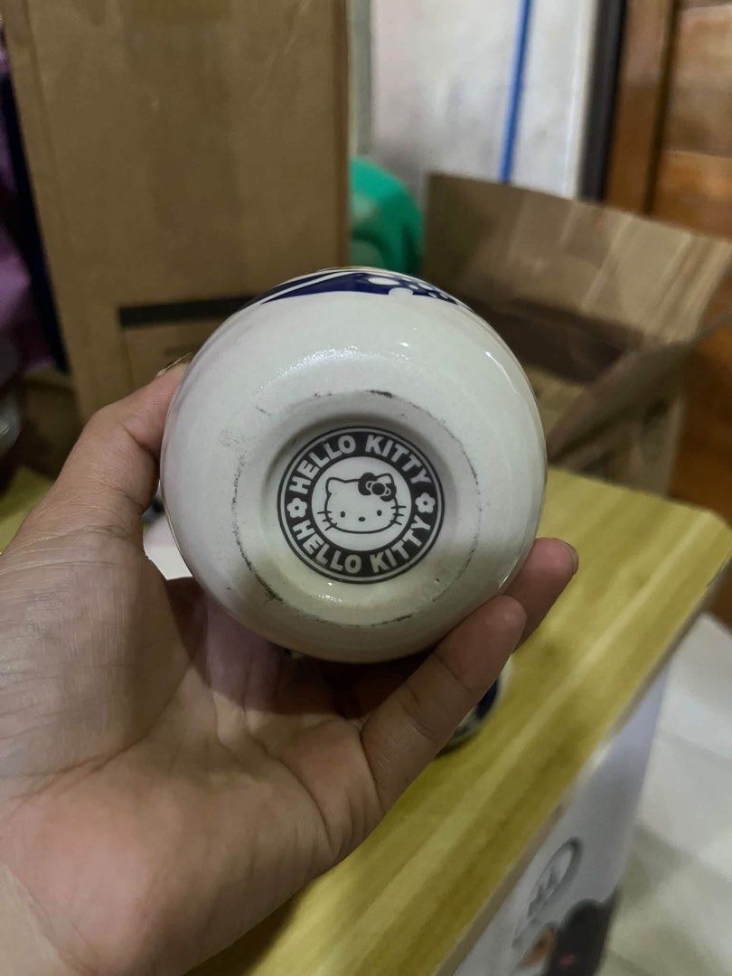 Hello Kitty ceramic sake bottle tokkuri japanese set (Category: Pitchers & Dispensers) located in Manila. Submitted by janetecson05 (Listing ID 1467626239, Image 3). Description: - Official Kitty ceramic sake bottle (tokkuri) with Sanrio stamp on the bottom - Features a charming blue and white sushi graphic design - Traditional narrow-neck shape - Great collectible for Kitty and Sanrio fans - Multiple pieces available for purchase.